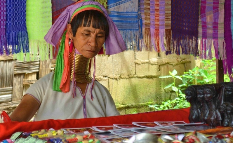 A Karen woman wearing the traditional neck rings.